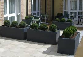 An attractive addition to any. This Photo About Modern Planters Best Decoration Home Entitled As Outside Planter Black Large Outdoor Planters Outdoor Planter Designs Contemporary Planters