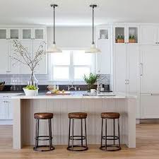 Light Gray Shiplap Kitchen Island With White Vintage Barn Pendants Modern Farmhouse Kitchens Kitchen Design Farmhouse Kitchen Cabinets