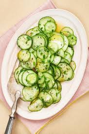 The Easiest Tangy Cucumber Salad Recipe Pickled Cucumber Salad Cucumber Recipes Salad Cucumber Salad