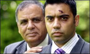 Burnley&#39;s deputy mayor, Rafiq Malik, with his son, Shahid. Rafiq Malik&#39;s son, Shahid, suffered cuts from a shield - _1409291_malikpa300