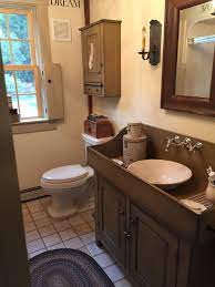 Many time we need to make a collection about some images to add your insight, may you agree these are artistic galleries. Batheroom This Bathroom Has The Detailed Woodwork In The Vanity And The Mirror It Has Stra Primitive Bathrooms Primitive Country Bathrooms Primitive Bathroom