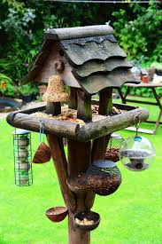 Bird Feeding Station Ideas Ideas For Setting Up A Bird Feeding Station It S All For The Birds Bird Feeders Decorative Bird Houses Bird Feeder Station