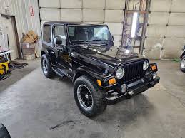 Image result for Brilliant Black 2004 Jeep