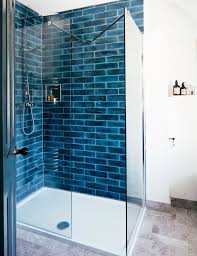 Filter, save & share beautiful glass tile bathroom remodel pictures, designs and ideas. We Love The Use Of Blue Tiles For A Slightly Different Take On Metro Tiled Showers Sho Blue Bathroom Tile Bathroom Inspiration Decor Glamorous Bathroom Decor