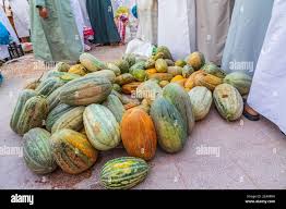 Middle East, Arabian Peninsula, Oman, Ad Dakhiliyah, Nizwa. Large melons  for sale at the souk in Nizwa Stock Photo - Alamy