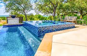 The tiles have a mosaic pattern that offers relaxing appeal. Swimming Pools With Spas 6 Lifestyle Benefits A Spa Offers