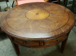 Classic lines inform the natural wood construction of this. This Was A Beautiful 40 Round Coffee Table On Casters With 4 Round Drawers And The Inlay Pattern In The Middle In The Downtown Underground Suite 368 Auction By Dale Wilch Equip Bid