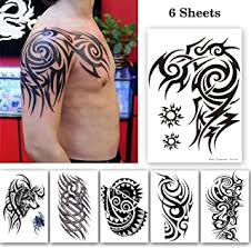 In hindu religion, the symbol om is referred to lord shiva and this symbol is combined with the sun is the indefinite combination. Amazon Com Tribal Tattoo