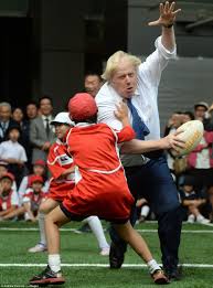 Boris Johnson Flattens Japanese Schoolboy During Game Of Street Rugby Daily Mail Online Slow the disease's spread, but don't stop it.