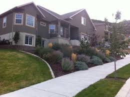 Make a fantastic first impression with creative plantings that frame your front door. Beautiful Custom Home With Amazing Views Eagle Mountain Ut Yard Landscaping Front Yard Landscaping Front Yard