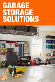 Organized garage after adding shelving, hanging plant racks, and bike hooks. Garage Storage Solutions Home Depot Novocom Top