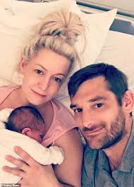 Toddler with dwarfism takes her first steps thanks to her doting dog who's  been her pal since birth