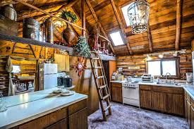 Cabins are decorated in white and taupe, with maroon accents, taupe sofas and blond wood. Effective Decorating Ideas For Rustic Cabins Caandesign Architecture And Home Design Blog