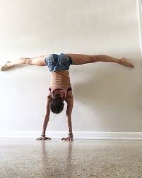 Forget The Mat Try These 25 Wall Yoga Poses Wall Yoga Easy Yoga Workouts Yoga Fitness