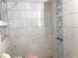Wall and floor tile texture ideas can be very useful when you are looking for a way to customize the look of your home. Satori Statuario Polished 12 In X 24 In Polished Porcelain Marble Look Floor And Wall Tile Lowes Com Wall Tiles Porcelain Tile Shower Walls Floor And Wall Tile
