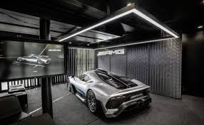 Mercedes Amg One F1 Inspired Supercar Slims Down Name Garage Design Car Showroom Design Car Showroom Interior