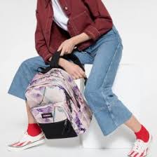 A roomy, zippered pencil case to keep small essentials in one place and coordinate with your bag height: Pinnacle Pink Ray Backpack Eastpak