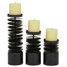 This lovely carved geometric design works for rustic, farmhouse. Set Of 3 Round Metal Layered Candle Holders Black Olivia May Target