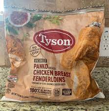 Breading set in vegetable oil. Uncooked Panko Breaded Chicken Breast Tenderloins Tyson