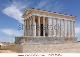 Side View Of Maison Carree Square House Ancient Building In Nimes Provence Southern France One Of Th Ancient Buildings Blue Sky Images Historic Buildings