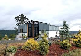 From a large number of projects of houses and cottages in our portfolio can not be found two similar. This Family Home Is Two Tiny Houses Connected By A Sunroom