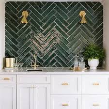 If you have a white kitchen with stainless steel appliances, then you can never go wrong with a dark blue backsplash. Glossy White Herringbone Backsplash Tiles Design Ideas