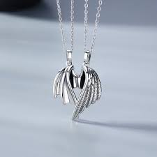 Devilish red heart with black horns, wings and tail at halloween, illustration. Angel And Demon Wings Matching Necklaces Set In Sterling Silver