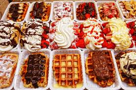 Traditional belgium food hot spots and restaurants serving dishes like beef stews and typical products like waffles and chocolates. Must Try Street Food In Brussels Food Travel In Belgium Belgium Food Stalls