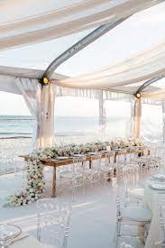 This is the ultimate guide to beach wedding attire for guests! 22 Ideas For An Elevated Beach Wedding Beach Wedding White Destination Wedding Mexico Beach Theme Wedding