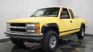 Image result for Bright Yellow 1990 Truck