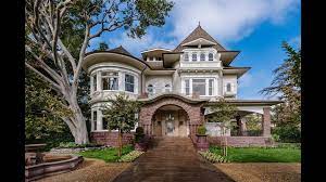 It is built around the grounds of a private golf club. A Renovated Victorian In Los Angeles With Views Of The Hollywood Sign Mansion Global