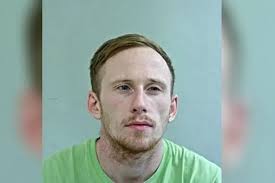 Couple were watching TV when men smashed through patio doors with crow bars  and baseball bat