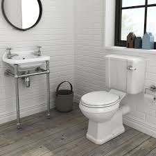 The small bathroom decor idea frees up floor space and gives the room a more open appearance. Modern Downstairs Toilet And Utility Room Design Ideas