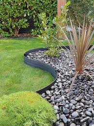 Provides a deeper topsoil layer for poor soil conditions improves drainage composite wood grain timbers manufactured from recycled post consumer plastic and. 23 Landscape Edging Ideas Landscape Edging Landscape Garden Edging