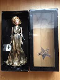 She was due to wear this incredibly plunging gold gown, while dancing provocatively with old boy lord beekman singing a song entitled down boy! Franklin Mint Marilyn Monroe Vinyl Doll Gold Lame Dress Pqs Quality Sample 1926233657