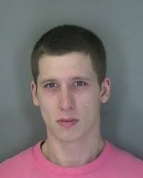 Two charged in home invasion