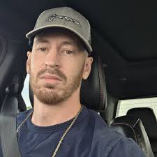 Where is the muffler in the Trx exhaust system?