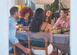 Well, today i've got you covered because i've collected over 50 impressive dinner recipes that you can serve to guests. Friends Enjoying Each Others Company At A Dinner Party Gathering In A Warm Cosy Home House Stock Photo Picture And Royalty Free Image Image 73770475