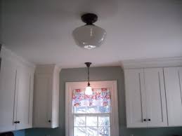 Pin By Shelley On The House Dining Room Lighting Colonial Kitchen Craftsman House