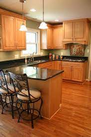 There is absolutely nothing wrong with a classic white, however, sage green is the next big thing. Maple With Green Green Kitchen Walls Kitchen Wall Colors Kitchen Design