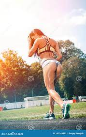 Sports Young Athletic Woman in Erotic Shorts Staying or Wal Stock Photo -  Image of female, brunette: 107749592