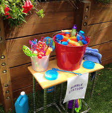 Backyard Bubble Station At My Daughter S First Birthday Party Backyard Birthday Parties Birthday Party Activities Birthday Activities