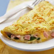 French omelets are smooth and sunny yellow with the filling rolled neatly inside. How To Make An Omelet Steps Tips Incredible Egg