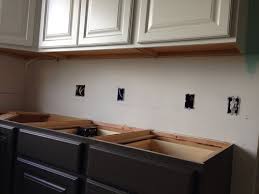 Typically, upper cabinets are much shallower than lower cabinets in a typical kitchen, we think of upper and lower cabinets as being distinctly different, particularly when it comes to the depth. Should The Underside Of White Painted Semi Custom Upper Cabinets Be Fi