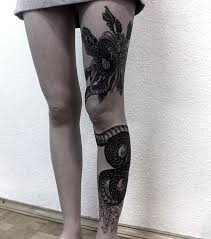 Black ink snake with flower tattoo design for leg calf by pale september. 28 Snake Tattoos On Leg