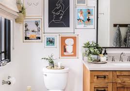 Anime woman wearing crop top and red shorts leaning on wall wallpaper. 15 Bathrooms With Beautiful Wall Decor That Will Inspire A Refresh