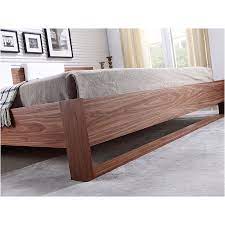 It features smooth dark walnut oil coated veneer bed sides and headboard front with clean lines and intersecting patterns. Modern Beds Blair Queen Walnut Bed Eurway