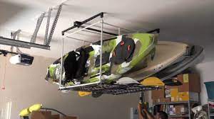 This ceiling storage lift by racor is perfect for storing bulky items that would normally take up floor space like outdoor furniture, boxes and totes. Garage Kayak Hoist Storage Solution Youtube
