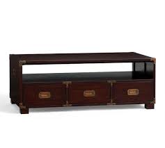 The uniqueness of the base allows you to use it as a conversation. Devon Campaign Coffee Table In Brown