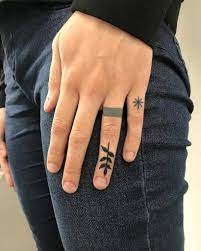 Small Tattoo Inked On The Left Hand S Ring Finger By Lukasz Krupinski Ring Finger Tattoo Small Finger Tattoos Knuckle Tattoos
